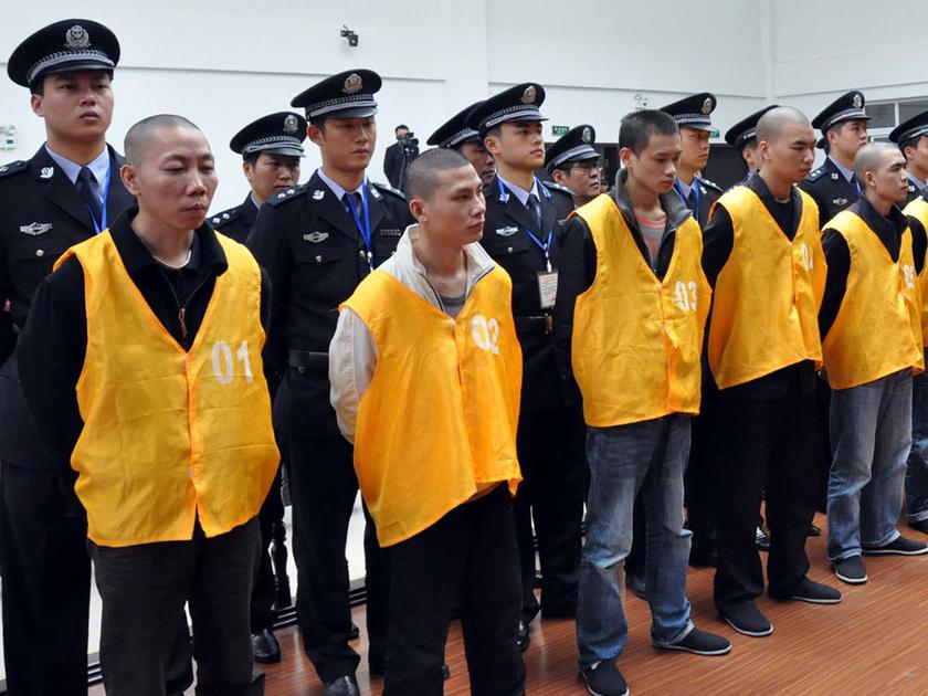 Defendants face sentencing for a variety of charges linked to organized crime, including murder and extortion, during a trial in southwest China's Chongqing municipality. u00e2u20acu201d AFP pic