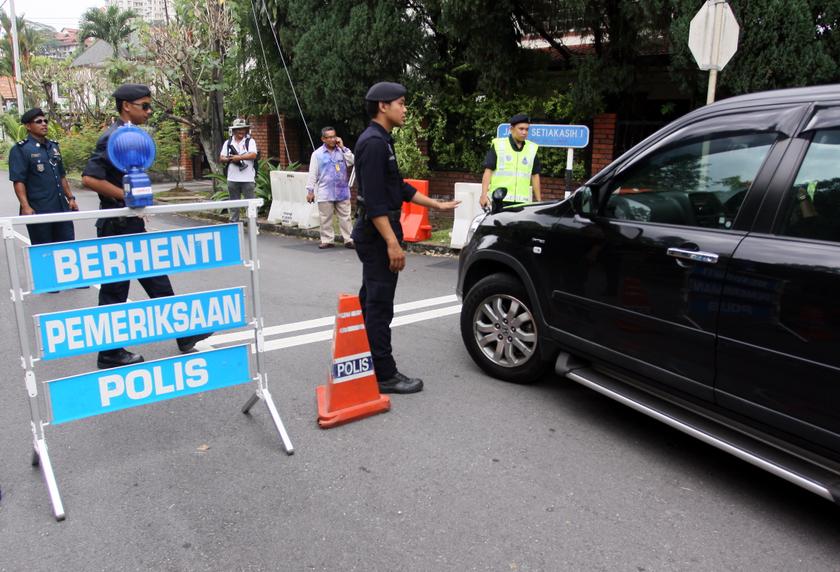 While cops weed out criminals on the streets, they should also look within. u00e2u20acu201d Picture by Malay Mail