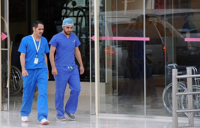 File photo shows Saudi medical staff leaving the emergency department at a hospital in the centre of the Saudi capital Riyadh on April 8, 2014, where the health ministry reported four more MERS cases in Jeddah. u00e2u20acu201d AFP pix