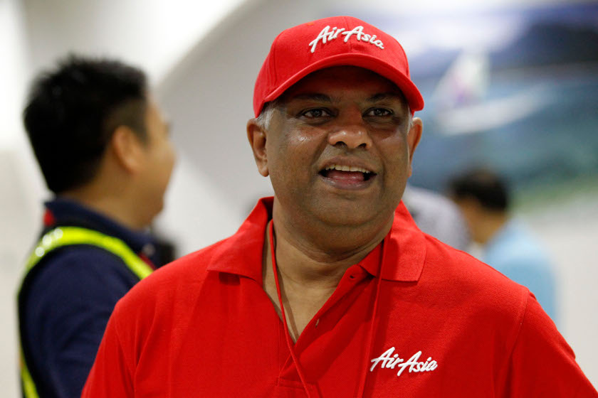 Tony Fernandes, CEO of AirAsia, looks on upon arrival at the domestic airport in Manila May 23, 2014. u00e2u20acu201d Reuters pic
