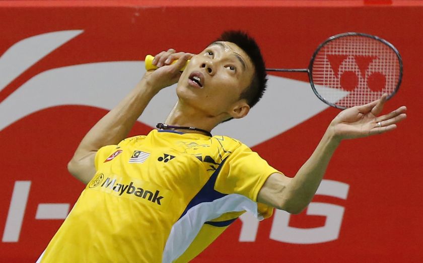 Malaysia's Lee Chong Wei returns a shot to Indonesia's Tommy Sugiarto during their men's singles semi-final match at the Thomas Cup badminton championship in New Delhi May 23, 2014. u00e2u20acu201d Reuters pic