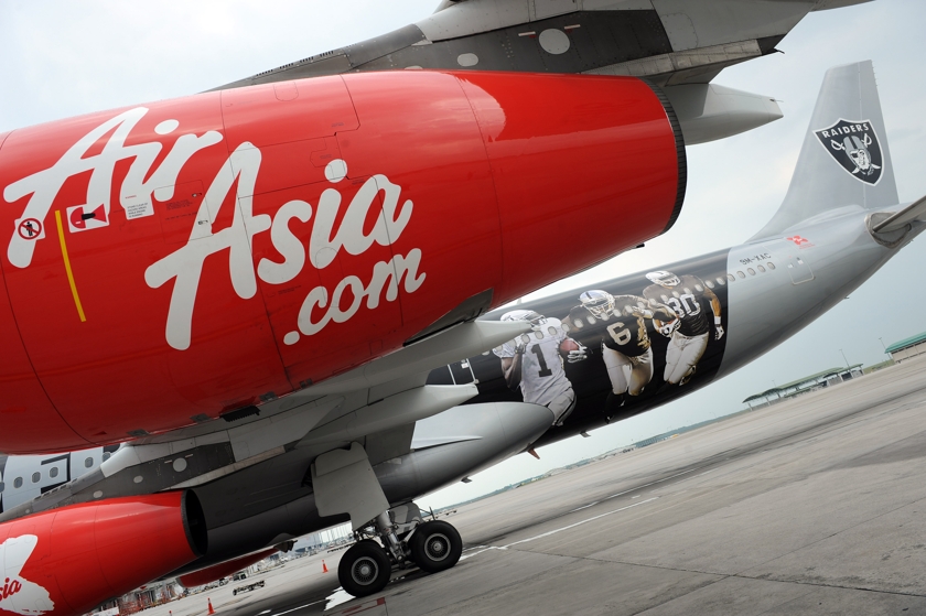 As at 11.40am, AirAsia shed three sen to RM1.10, with 35.63 million shares changing hands. — AFP pic