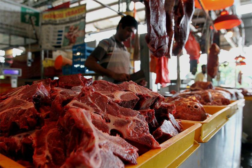 A butcher is seen cutting meat at the Pasar Borong Selangor in Seri Kembangan, Selangor. u00e2u20acu201dPicture by Yusof Mat Isa
