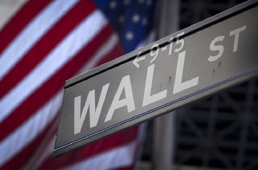 A Wall Street sign is pictured outside the New York Stock Exchange in New York, October 28, 2013. u00e2u20acu201d  Reuters pic