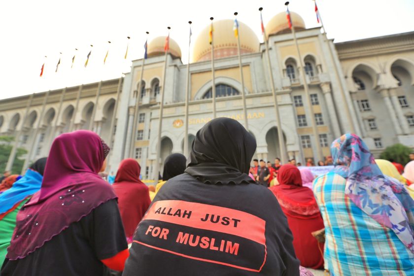 Muslim supporters gather in front of the Federal Court as they wait for the seven-member bench to decide on the appeal by the Catholic church against a lower courtu00e2u20acu2122s decision forbidding it to use the word 'Allah' in its publication. u00e2u20acu201d Picture by Saw S