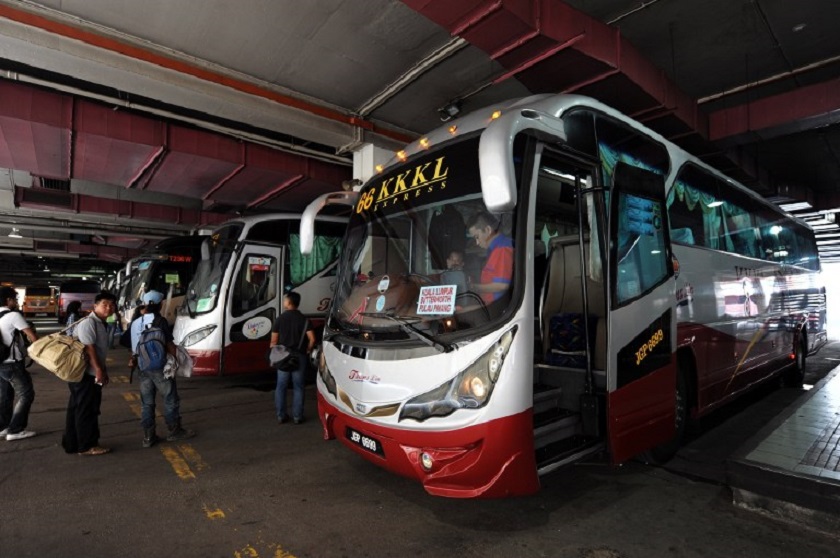 Passengers wait for thier bus at Pudu Bus Station in downtown Kuala Lumpur on January 29, 2010. u00e2u20acu201d AFP pic