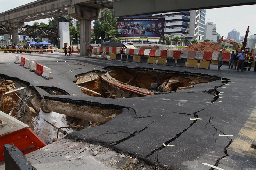 A huge sinkhole caused by a burst waterpipe is seen at Jalan Imbi in Kuala Lumpur, July 2, 2014. u00e2u20acu201d Picture by Yusof Mat Isa