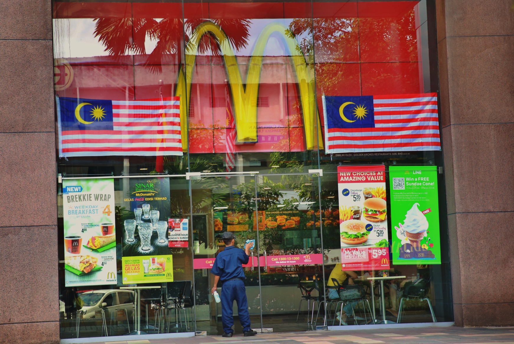 The entrance of a McDonaldu00e2u20acu2122s branch in Kuala Lumpur is shown in this photo illustration. u00e2u20acu201d Picture by Saw Siow Feng