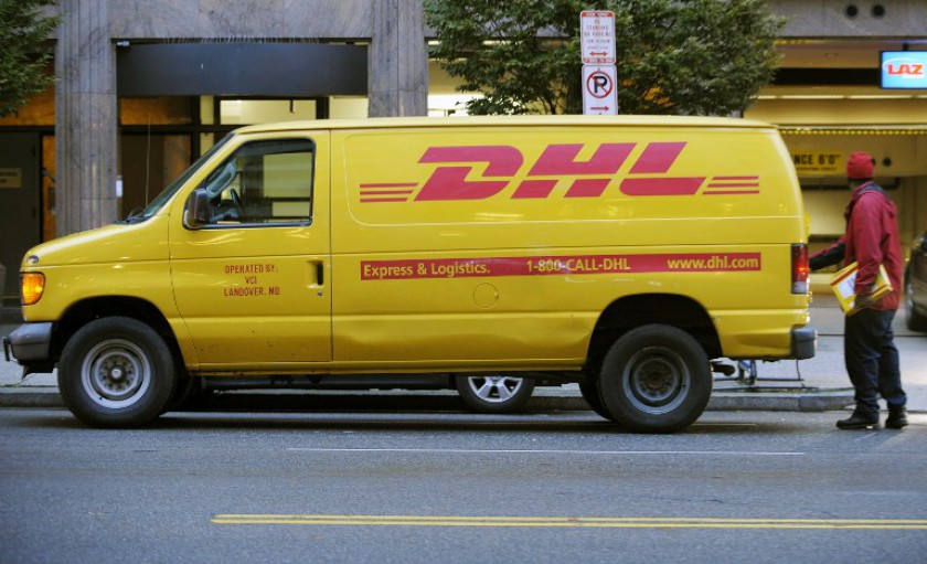 File picture shows a DHL employee delivering packets in Washington, DC. u00e2u20acu201d AFP pic