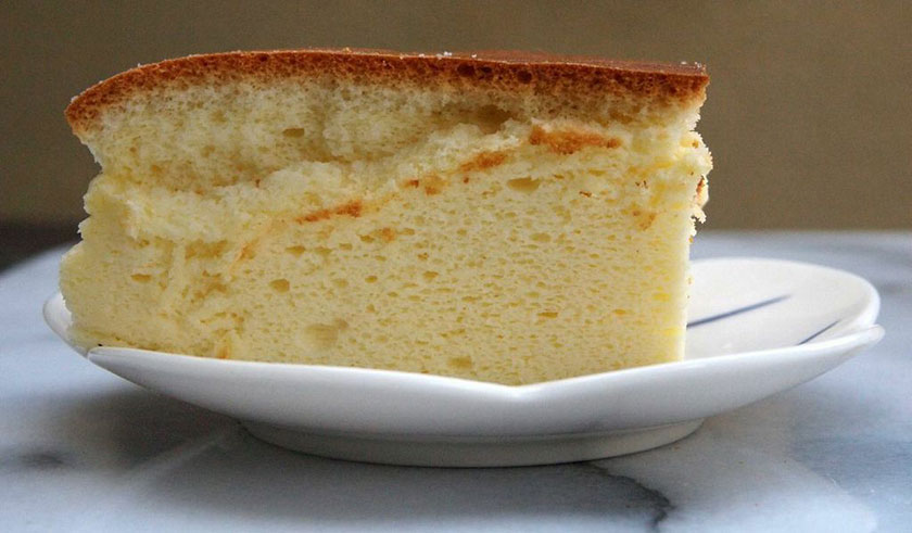 Uncle Miki's cheesecake has a crusty golden top with a sponge cake like texture