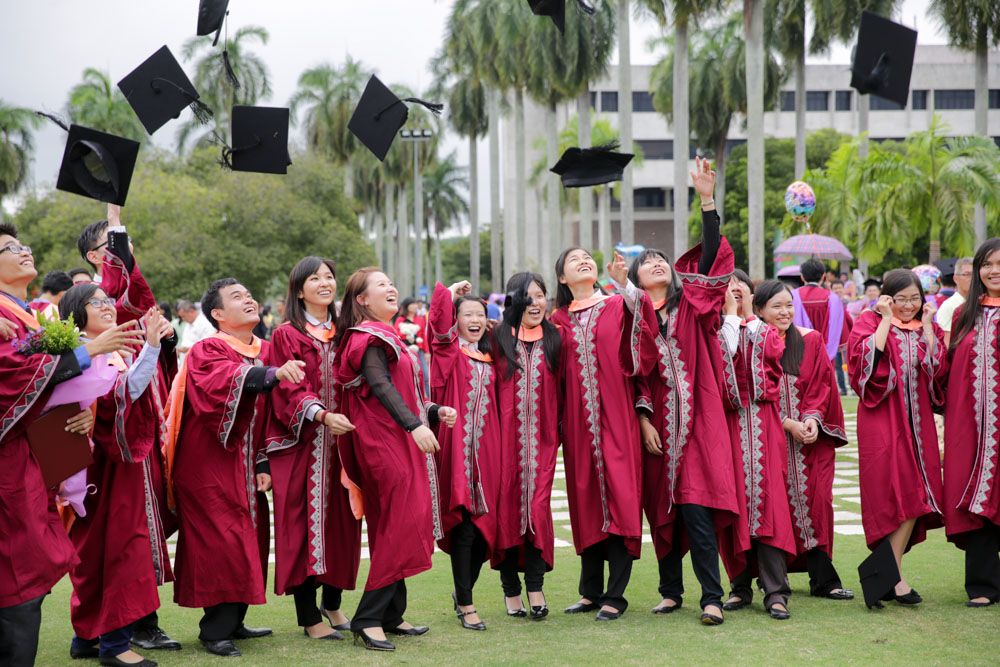 UPM graduates pose for pictures after their graduation ceremony at UPMu00e2u20acu2122s 38th Convocation Ceremony, November 1, 2014. u00e2u20acu201d Picture by Choo Choy May