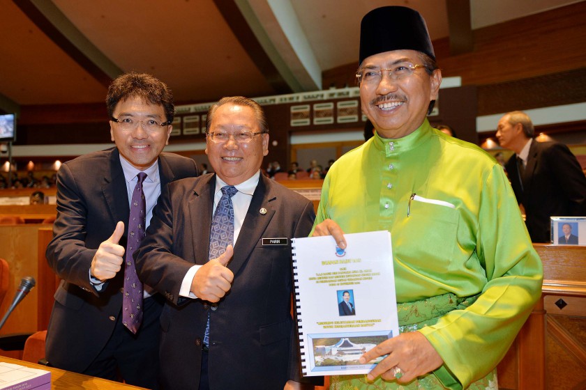 Sabah Chief Minister Datuk Seri Musa Aman (right) who is also Finance Minister displaying the State Budget 2015 with deputy chief ministers Tan Sri Joseph Pairin Kitingan(centre) and Datuk Seri Raymond Tan Shu Kiah, November 7, 2014, Kota Kinabalu. u00e2u20acu201d Pi