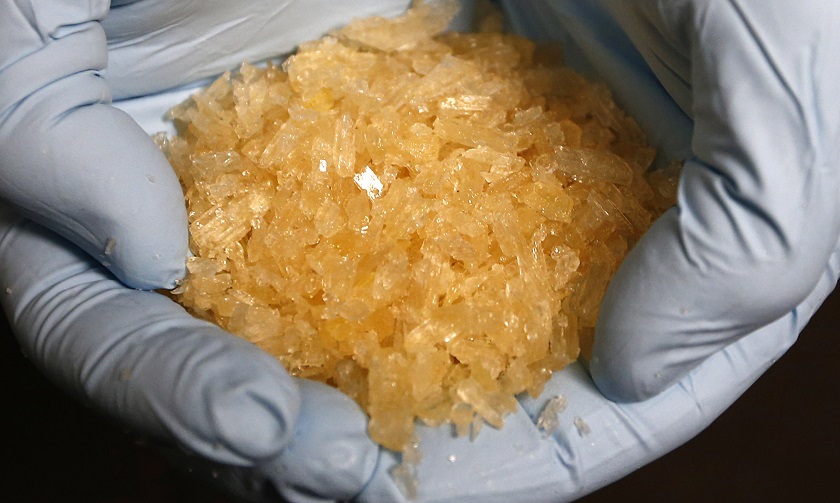 A member of the German Criminal Investigation Division displays Crystal Methamphetamine (Crystal Meth) during a news conference in Wiesbaden in this November 13, 2014 file picture. u00e2u20acu201d Reuters pic