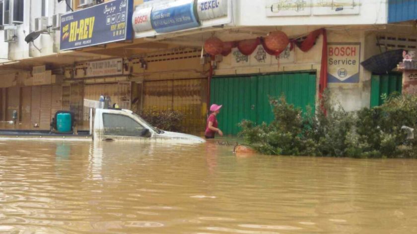 The water levels at Jalan Chin Hwa in Kuala Krai, Kelantan over the course of four days, from December 25 to December 28, 2014. u00e2u20acu2022 Picture courtesy of Ryonn Leong