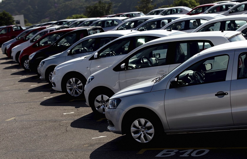 Vehicles sit parked in a lot at a General Motors vehicle factory in Sao Jose dos Campos near Sao Paulo, February 26, 2015. u00e2u20acu201d Reuters pic