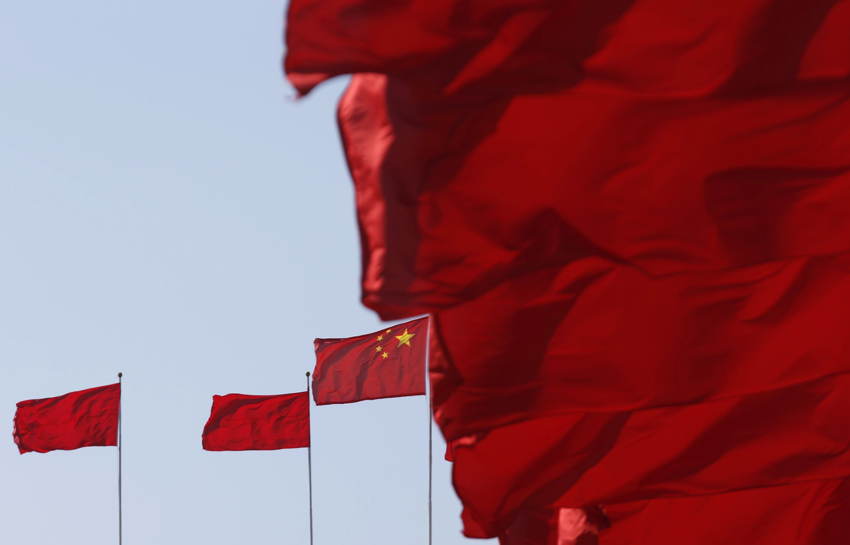 Flags flutter ahead of the opening session of Chinese People’s Political Consultative Conference (CPPCC) at Tiananmen Square in Beijing, March 3, 2015. — Reuters pic