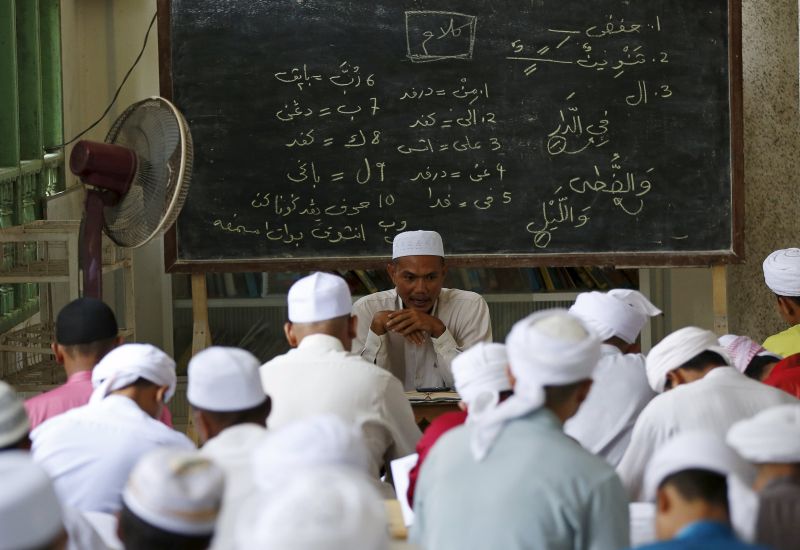 Islamic students take a class at Madrasah Ad-Diniyyah Al-Bakhriyyah in Kota Baru April 5, 2015. u00e2u20acu2022 Reuters pic