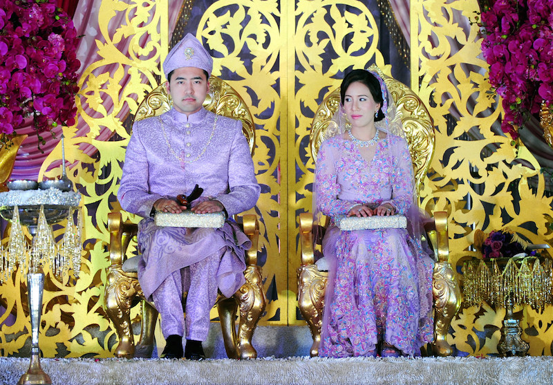 The daughter of Prime Minister Datuk Seri Najib Razak, Nooryana Najwa, and her husband Daniyar Kessikbayer are seated on the wedding dais during their wedding reception in Pekan April 4, 2015. u00e2u20acu201d Bernama pic
