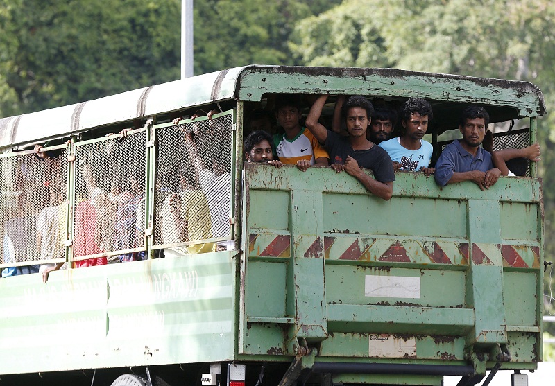 Rohingya and Bangladeshi refugees are transported to a navy boat where they will be taken to mainland Malaysia, after they landed at Pantai Pasir Berdengung beach in Langkawi, Kedah, May 15, 2015. u00e2u20acu201d Reuters pic