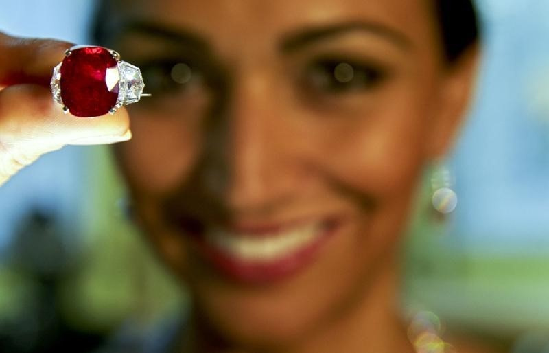 A model holds the 'Sunrise Ruby,' a Burmese ruby weighing 25.59 carats, during an auction preview at Sotheby's auction house in Geneva, May 6, 2015. u00e2u20acu201d Reuters pic