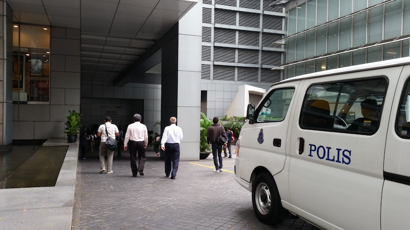 Police van parked at Menara IMC, 1Malaysia Development Berhad's office, in Kuala Lumpur, July 8, 2015. u00e2u20acu201d Picture by Ida Lim