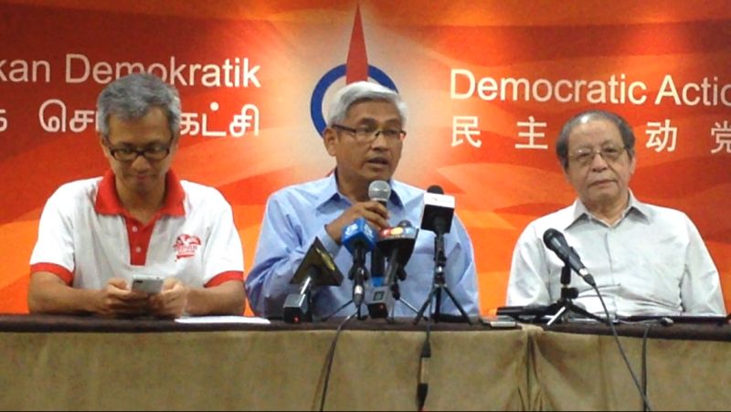 Dr Abdul Aziz Bari (centre) speaks about his decision to join DAP. u00e2u20acu2022 Picture by Melissa Chi