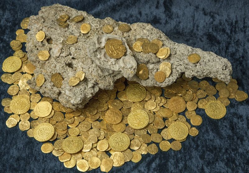 Hundreds of rare gold coins dug out of the walls of a remote French mansion fetched more than €1 million at an auction. — Reuters pic