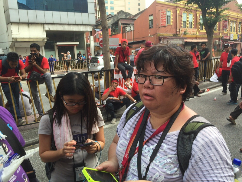 Malaysiakini reporter Kow Gah Chie is seen at the 'Himpunan Rakyat Bersatu' rally in Kuala Lumpur, September 16, 2015. u00e2u20acu201d Picture by Kamles Kumar