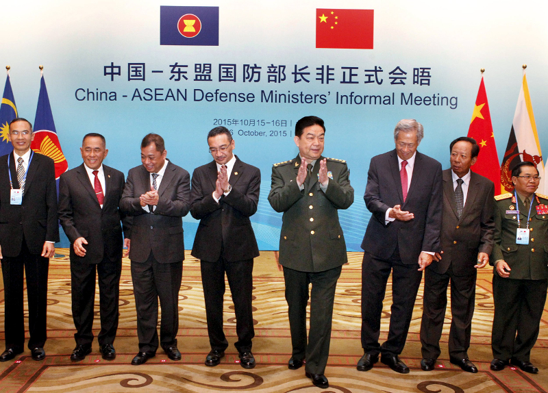 Chinese Defence Minister Chang Wanquan (4th right) claps next to his counterparts from Asean during the China-AseanDefense Ministers' Informal Meeting in Beijing, China, October 16, 2015. u00e2u20acu201d Reuters pic