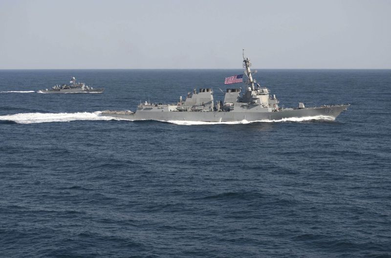 USS Lassen (DDG 82) (R) transits in formation with ROKS Sokcho (PCC 778) during exercise Foal Eagle 2015, in waters east of the Korean Peninsula, in this March 12, 2015, file handout photo provided by the US Navy. REUTERS/US Navy handout