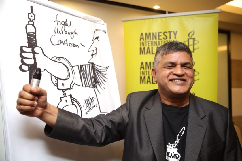 Cartoonist Zulkiflee Anwar Ulhaque is selected as the first Malaysian to be a part of Amnesty Internationalu00e2u20acu2122s u00e2u20acu02dcWrite for Rightsu00e2u20acu2122 (W4R) 2015 campaign at Best Western Hotel, Petaling Jaya, October 2, 2015. u00e2u20acu201d Picture by Choo Choy Maynn