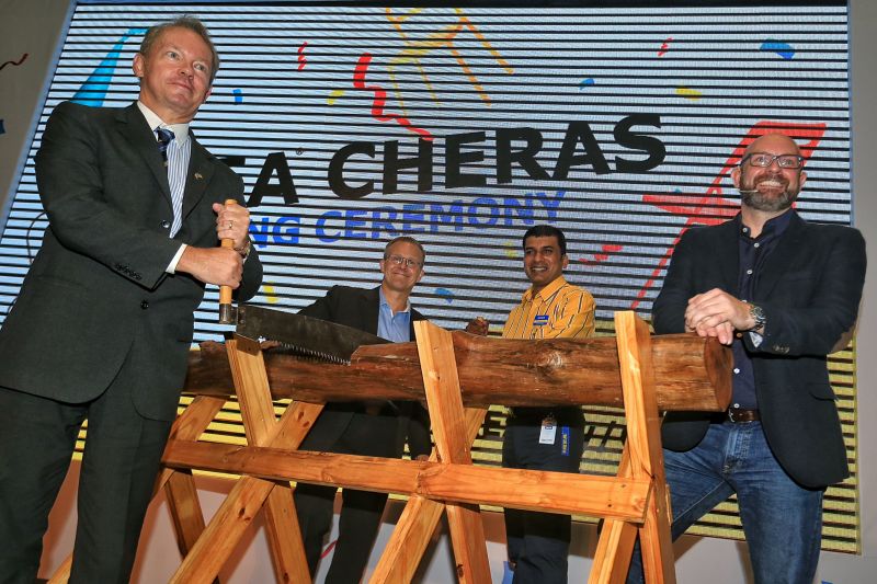 Christian Rojkjaer, Managing Director of Ikea Malaysia, Singapore and Thailand (left) and Mike King, Retail Director (right) launch Ikea Cheras with a log-cutting ceremony. u00e2u20acu2022 Picture by Saw Siow Feng