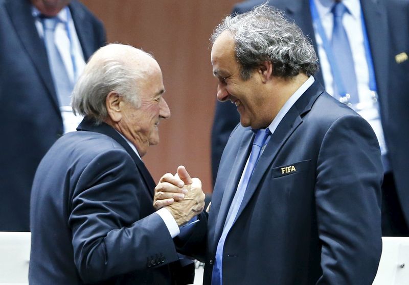 UEFA president Michel Platini (right) congratulates FIFA President Sepp Blatter after he was re-elected in Zurich, in this May 29, 2015 file photograph. u00e2u20acu201d Reuters pic