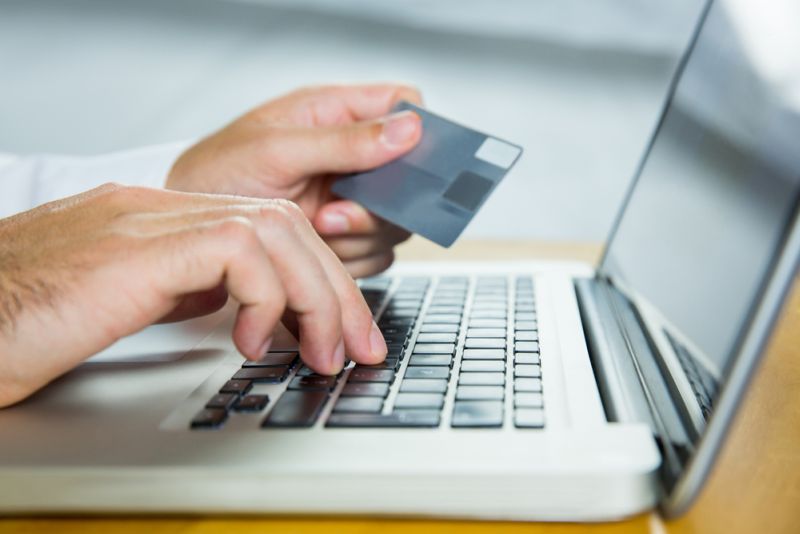 Generic: Man using laptop for online shopping in close up, bank, money, computer.u00c2u00a9wavebreakmedia/Shutterstock