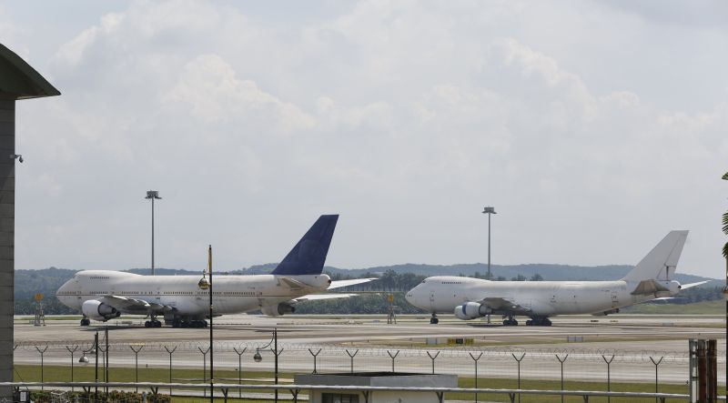 Two of three abandoned Boeing 747-200F planes are seen parked on the tarmac at Kuala Lumpur International Airport in Sepang, Malaysia, December 10, 2015. u00e2u20acu2022 Reuters pic