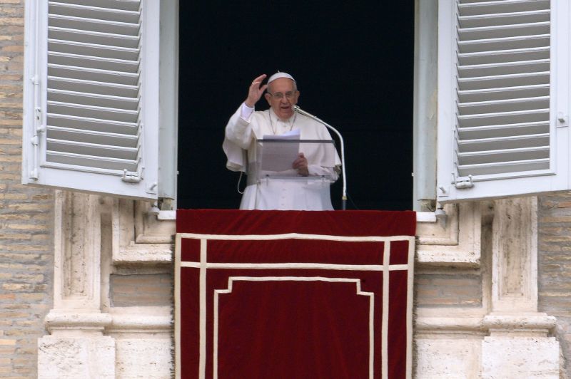 Pope Francis delivers the Sunday Angelus prayer from a window of the apostolic palace overlooking St Peteru00e2u20acu2122s square, December 6, 2015, at the Vatican. AFP PHOTO / FILIPPO MONTEFORTE