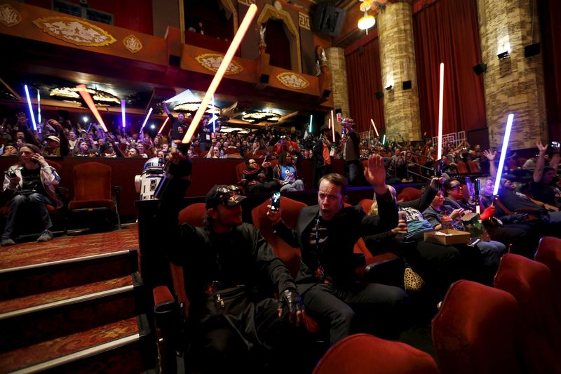 Moviegoers cheers and wave lightsabers before the first showing of the movie 'Star Wars: The Force Awakens' at the TCL Chinese Theatre in Hollywood, December 17, 2015. u00e2u20acu201d Reuters pic