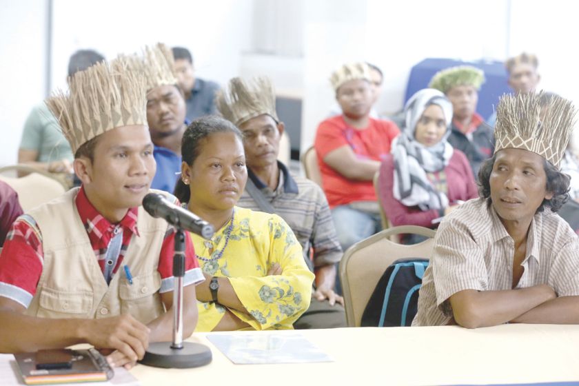 Orang Asli Network of Kelantan deputy chairman Nasir Dollah speaks at the press conference. On his left are Midah and Ayel. u00e2u20acu201d Picture by Zuraneeza Zulkifli