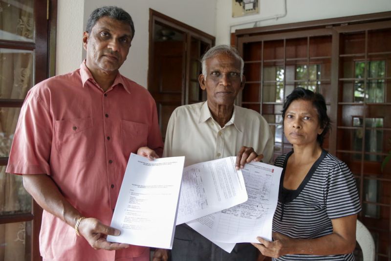 Rajkumar, Thiran and Sarojini managed to get over 30 residents around Jalan Kasah to sign the petition against allowing residential buildings be converted for commercial use. u00e2u20acu2022 Pictures by Choo Choy May