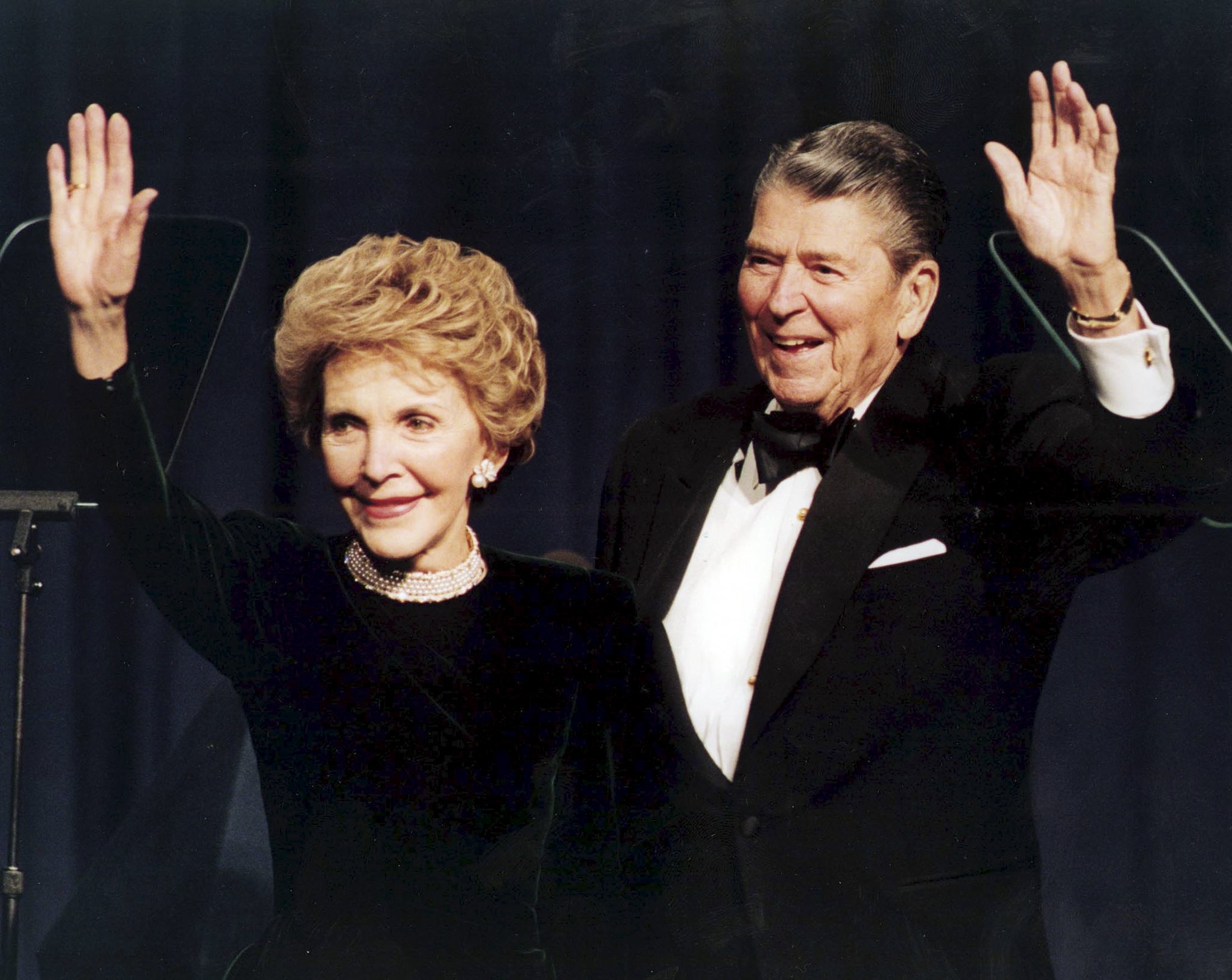 Former US President Ronald Reagan and his wife Nancy wave while attending a gala celebrating his 83rd birthday in Washington in this February 3, 1994 file photo. u00e2u20acu201d Reuters pic