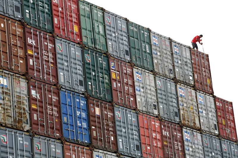 A worker inspects a container at North Port in Port Klang outside Kuala Lumpur in this January 8, 2009 file photo. u00e2u20acu201d Reuters pic