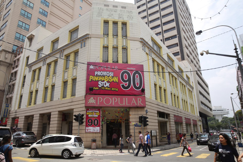 The Popular bookstore branch at the Art Deco-style Lee Rubber Building is a familiar landmark in the Petaling Street area. u00e2u20acu201d Picture by Choo Choy May