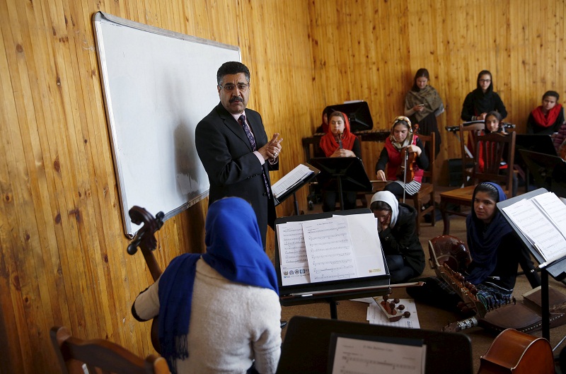 Ahmad Naser Sarmast, head of Afghanistan’s National Institute of Music, speaks to members of the Zohra orchestra, an ensemble of 35 women, in Kabul, Afghanistan April 4, 2016.