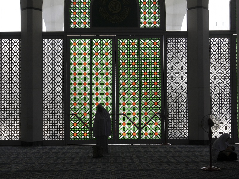 A woman prays on the second day of the holy month of Ramadan at the Sultan Salahuddin Abdul Aziz Shah Mosque, in Shah Alam June 7, 2016. u00e2u20acu201d Picture by Reuters