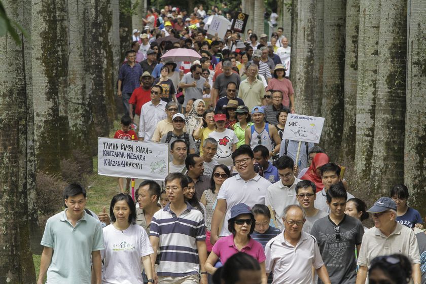 TTDI residents gather at the Bukit Kiara Rimba Park today to object to a new project they say will cause over-development of their neighbourhood. u00e2u20acu201d Picture by Yusof Mat Isa