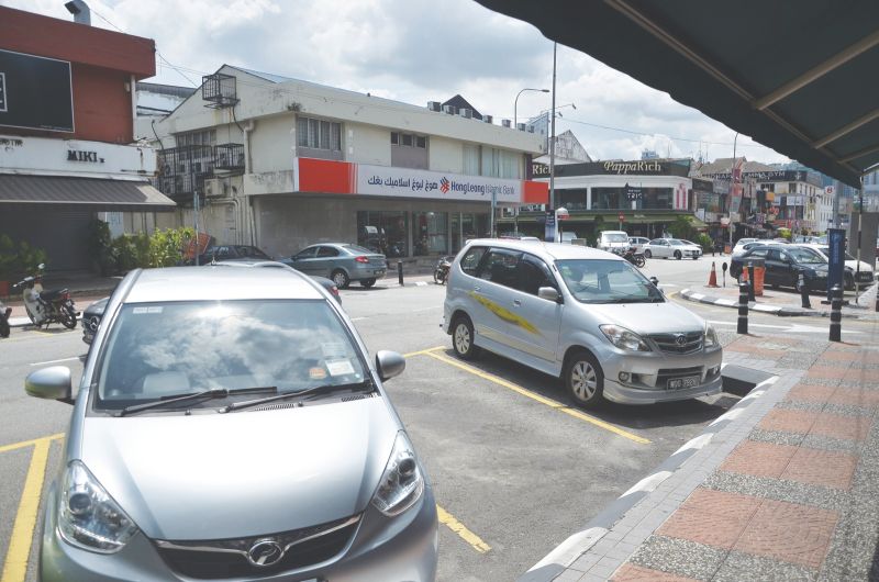 Since the new parking system and rates were enforced on Monday, there has been visibly less cars parked in Bangsar. u00e2u20acu201d Picture by Mukhriz Hazim