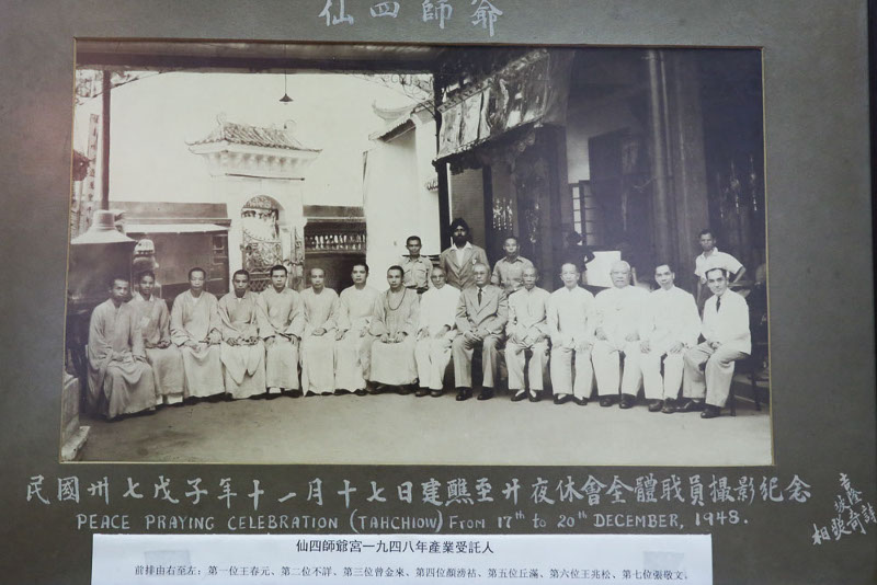 A group photo taken in 1948, that shows Ranjit's late father Sajan Singh, hangs on a wall within the Sin Sze Si Ya temple's main hall.