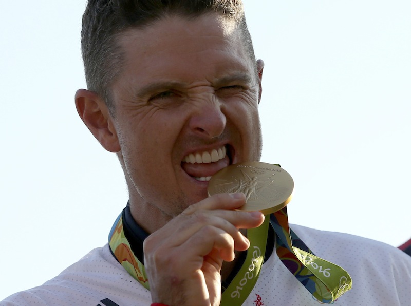 Justin Rose of Britain celebrates his gold medal win in the men's Olympic golf compeititon. — Reuters pic