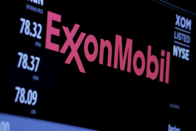 The logo of Exxon Mobil Corporation is shown on a monitor above the floor of the New York Stock Exchange in New York. u00e2u20acu2022 Reuters pic