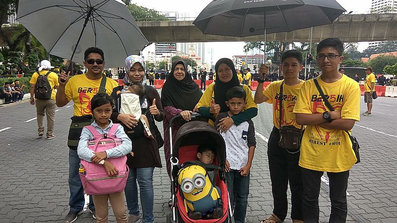 Yasri Said (far left) from Kedah with his family at the Bersih 5 rally today. u00e2u20acu2022 Picture by Yiswaree Palansamy